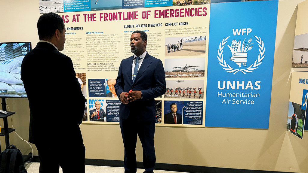 Hedley Tah (right), Head of External Relations for UN Humanitarian Air Service (UNHAS), speaks with UN News.